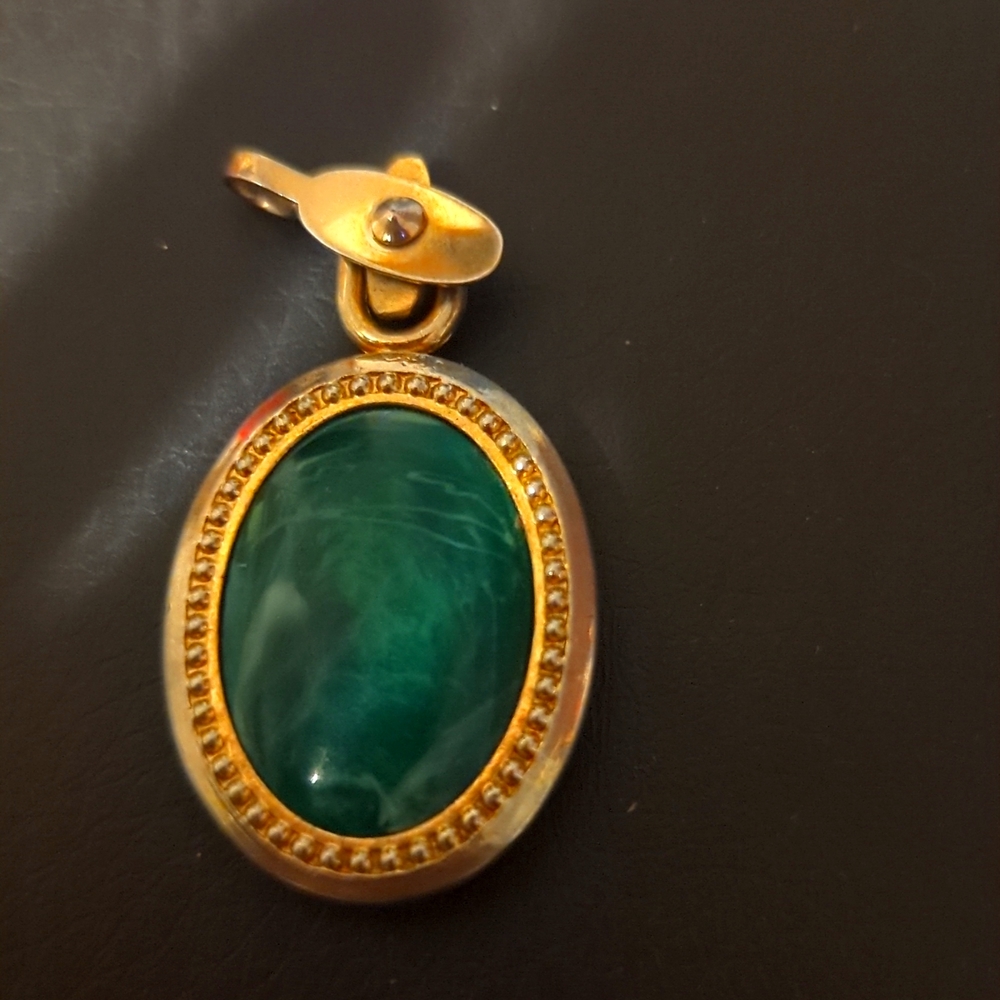 Initial pendant with green stone